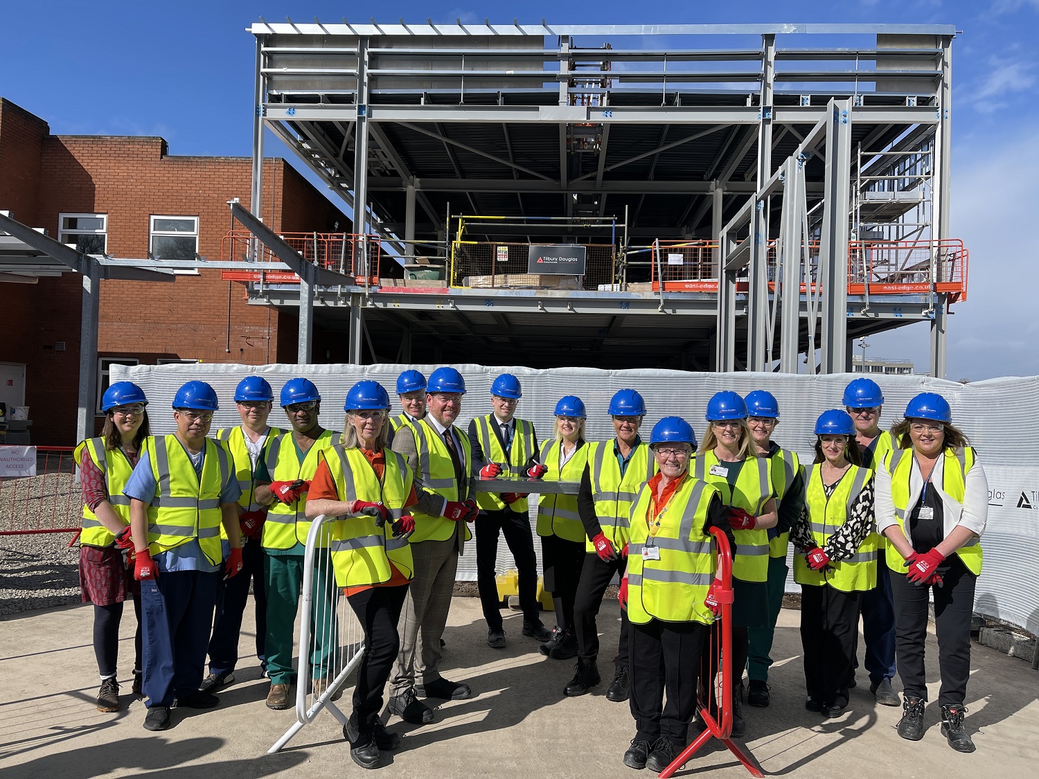 Beam signing ceremony marks A&E build milestone